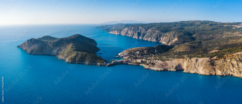 Aerial view of Assos in island of Cefalonia, Ionian, Greece. Aerial drone photo of beautiful and picturesque colorful traditional fishig village