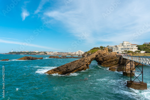 Wooden bridge together to Plage du Port Vieux in Biarritz, holiday in south-eastern France. Biarritz, department of Pyrenees-Atlantiques photo