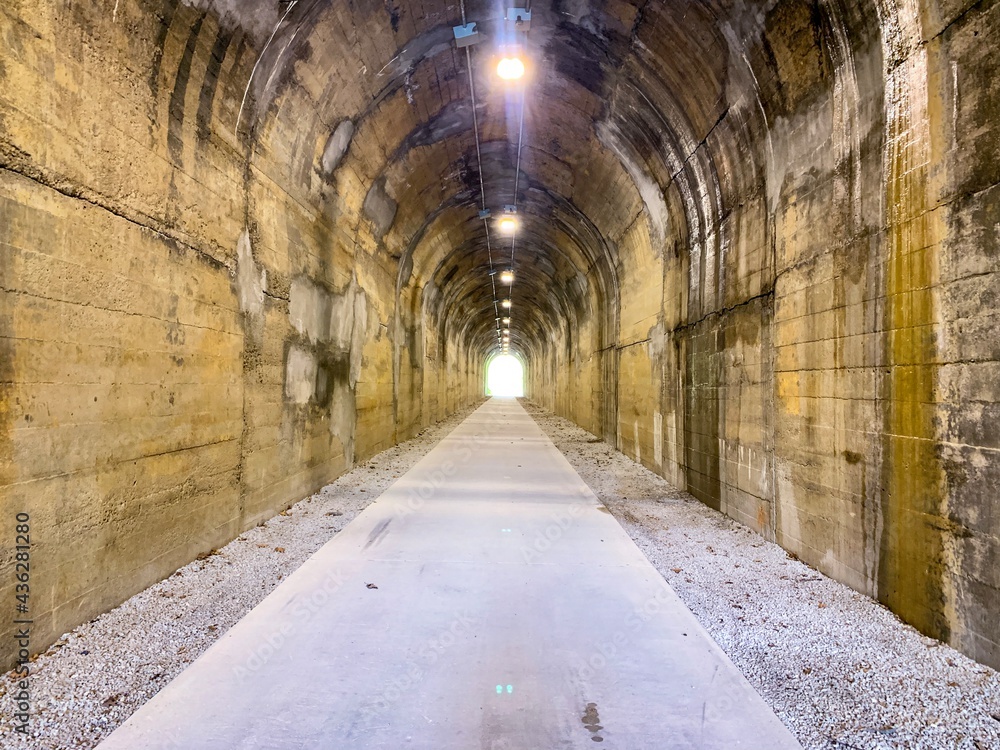 narrow path through tunnel