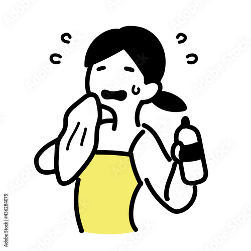 運動の後に水を飲んで汗を拭く 疲れた女性