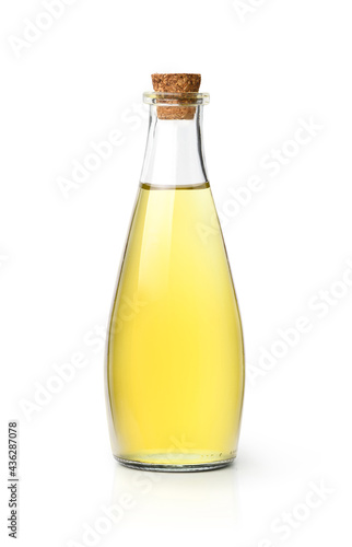 Bottle of vetgetable oil with cork cap isolated on whtie background. Clipping path.