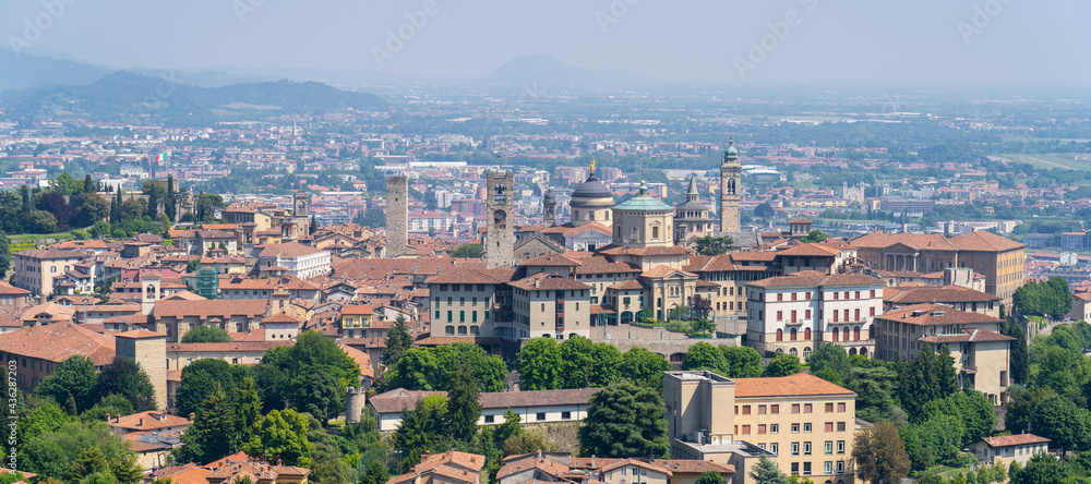 Bergamo. One of the beautiful city in Italy. Landscape at the old town from San Vigilio hill. Amazing view of the towers, bell towers and main churches. Touristic destination. Best of Italy