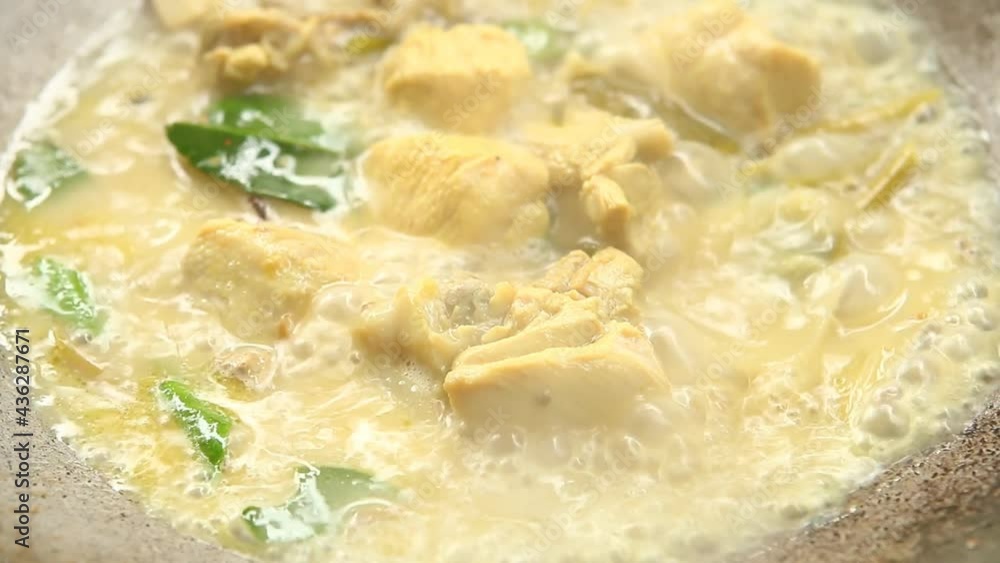 Boiling Tom Kha Gai or chicken coconut cream soup, Thai famous food. Boiling Tom Kha Gai or chicken coconut cream soup, Thai famous food.
