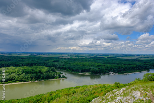 panoramic view from mountain braunsberg to the danube river and the national park donauauen near hainburg, austria photo