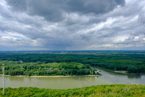 panoramic view from mountain braunsberg to the danube river and the national park donauauen near hainburg, austria photo