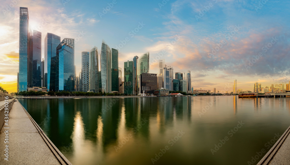 Singapore financial district skyline at Marina bay on sun set time, Singapore city, South east asia. Singapore financial district skyline at Marina bay on sun set time, Singapore city, South east asia.