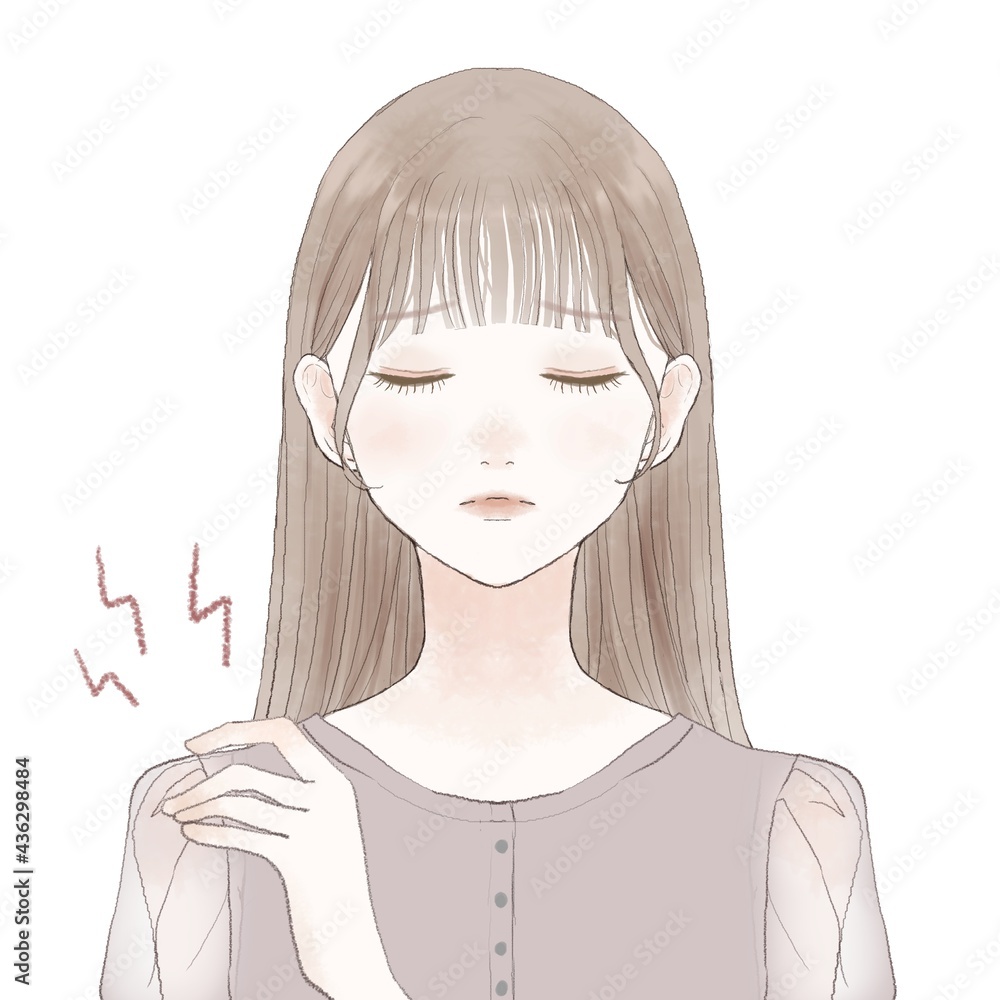 肩こりに悩まされる女性