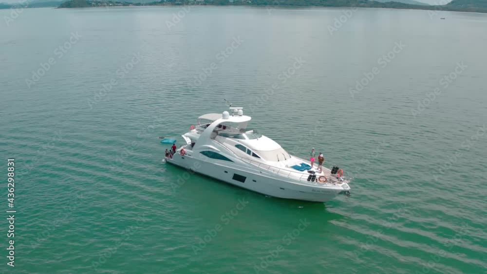 Island beach and yacht aerial view in Phuket, Thailand Island beach and yacht aerial view in Phuket, Thailand