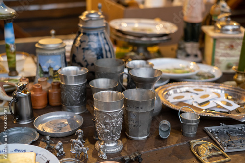 Various tableware on counter at souvenir bazaar