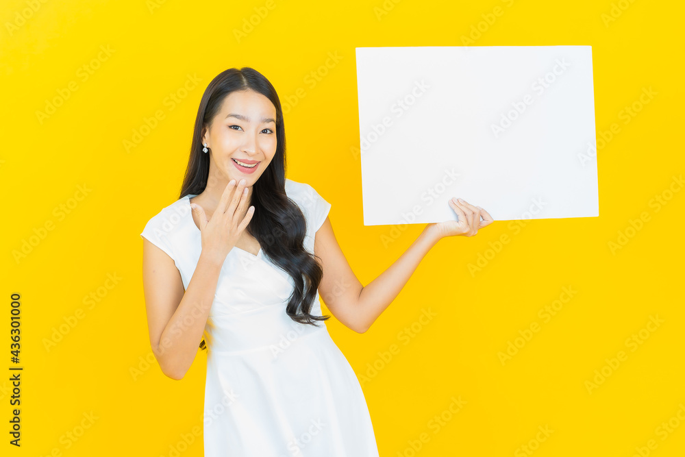 Portrait beautiful young asian woman with empty white billboard Portrait beautiful young asian woman with empty white billboard