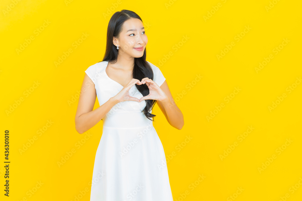 Portrait beautiful young asian woman smile with action Portrait beautiful young asian woman smile with action