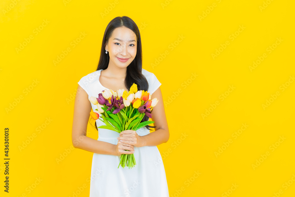 Portrait beautiful young asian woman smile with flower Portrait beautiful young asian woman smile with flower
