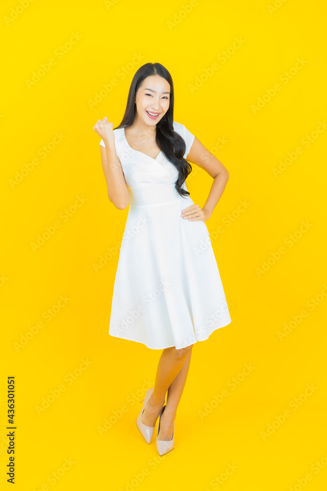 Portrait beautiful young asian woman smile with action Portrait beautiful young asian woman smile with action