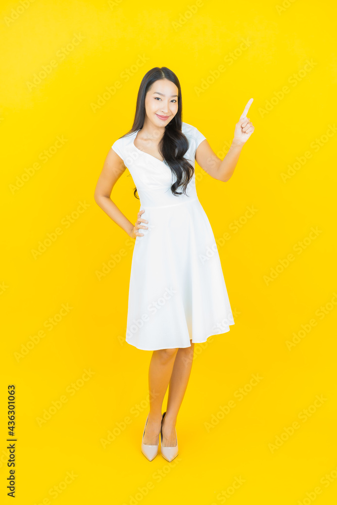 Portrait beautiful young asian woman smile with action Portrait beautiful young asian woman smile with action