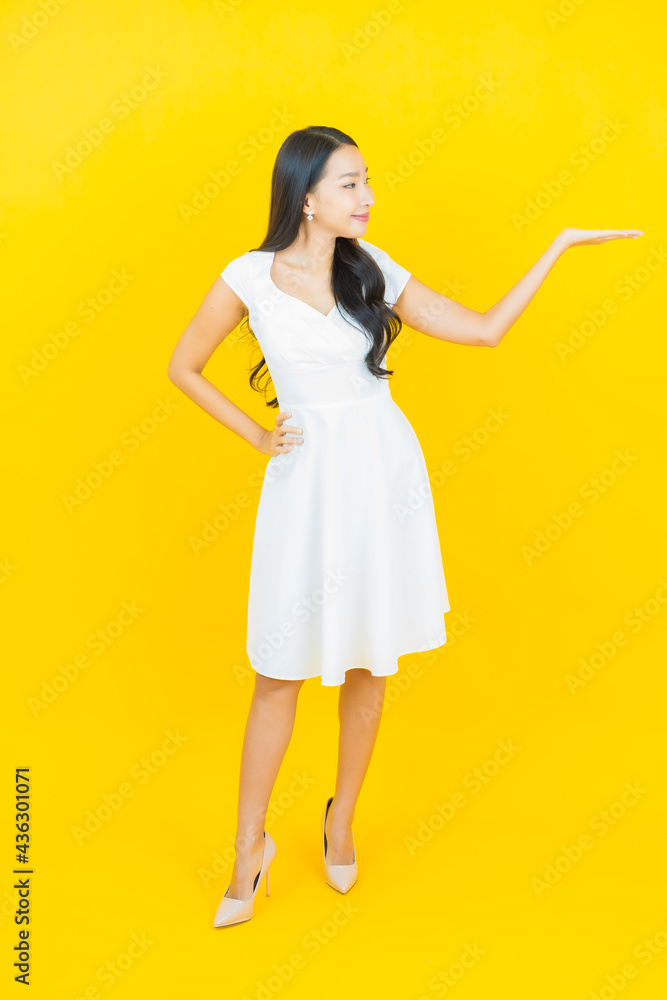 Portrait beautiful young asian woman smile with action Portrait beautiful young asian woman smile with action