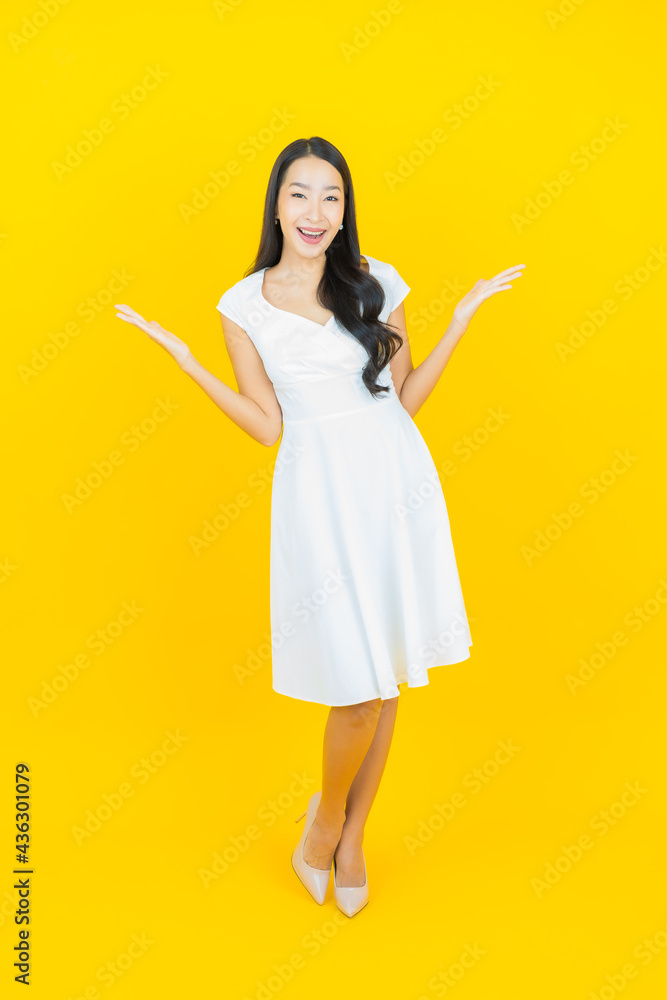 Portrait beautiful young asian woman smile with action Portrait beautiful young asian woman smile with action