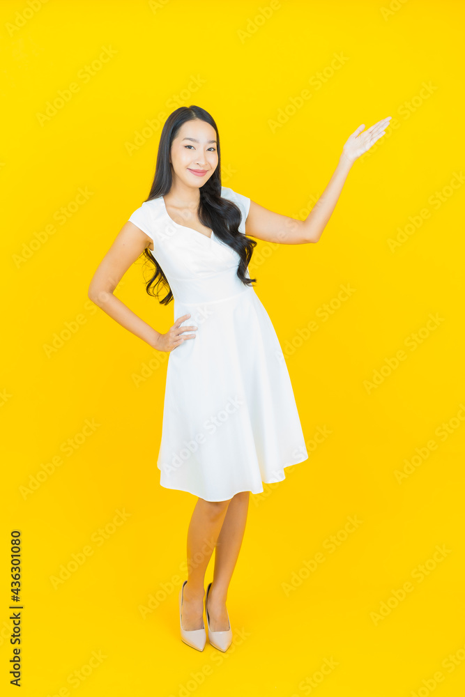 Portrait beautiful young asian woman smile with action Portrait beautiful young asian woman smile with action
