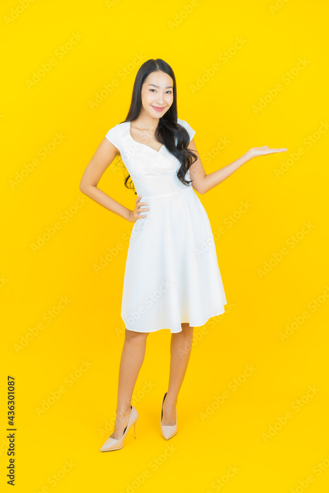 Portrait beautiful young asian woman smile with action Portrait beautiful young asian woman smile with action