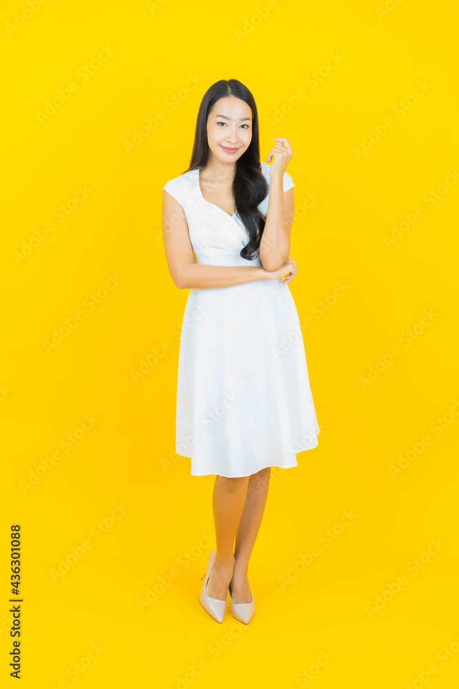 Portrait beautiful young asian woman smile with action Portrait beautiful young asian woman smile with action