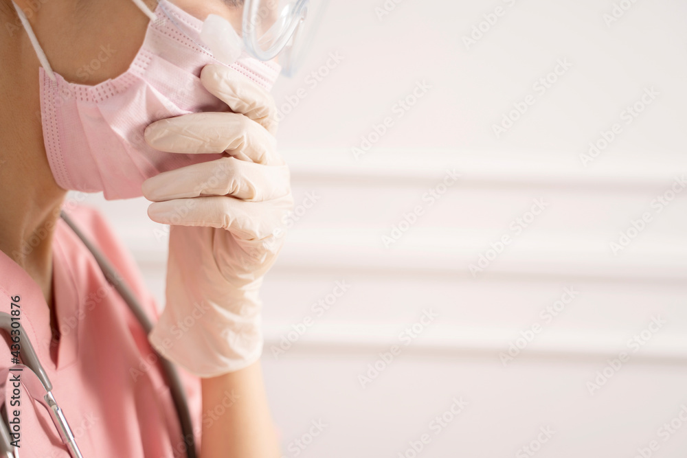 Obraz premium Concerned and worried doctor in protective mask.Doctor protection from Coronavirus, covid-19