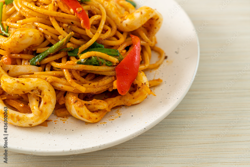 stir-fried spaghetti with salted egg and squid stir-fried spaghetti with salted egg and squid