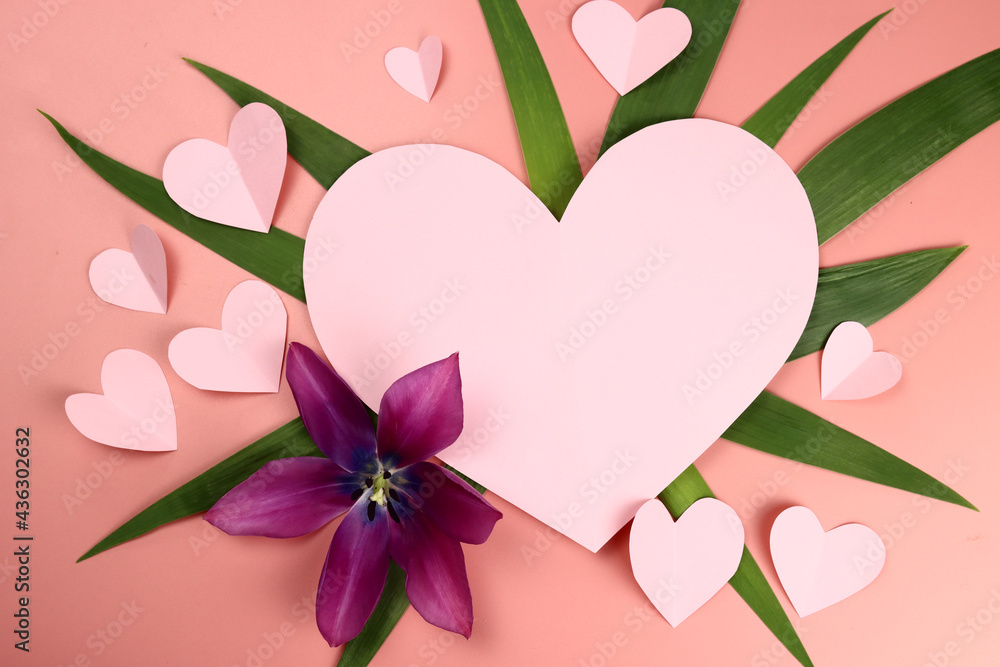 Love, wedding mock up of flowers, leaves and paper in the shape of a heart
