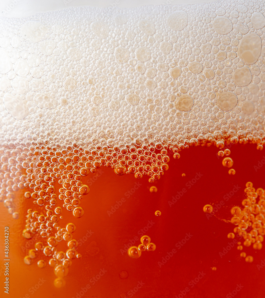 Fresh beer in a mug as a background. Fresh beer in a mug as a background.