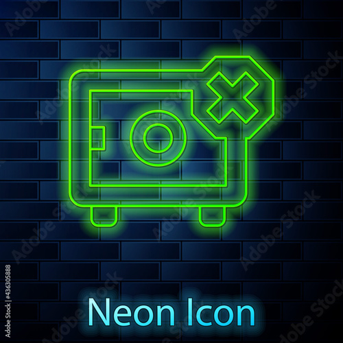 Glowing neon line Safe icon isolated on brick wall background. The door safe a bank vault with a combination lock. Reliable Data Protection. Vector