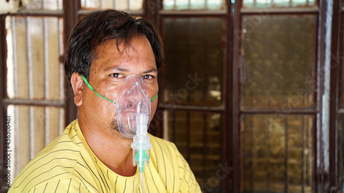Young Boy wearing oxygen mask COVID 19 concept. photo