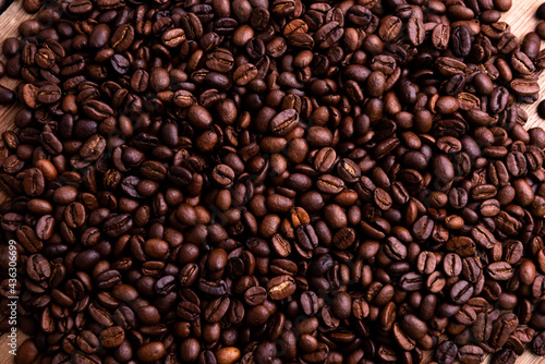Closeup on coffee bean. Fresh roasted coffee beans