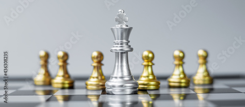 Chess king figure Stand out from the crowd on Chessboard background. Strategy, leadership, business, teamwork, different, Unique and Human resource management concept