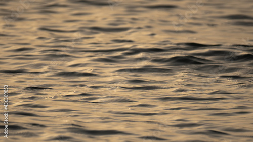 Abstract nature of Ocean wave in the early morning. selective focus