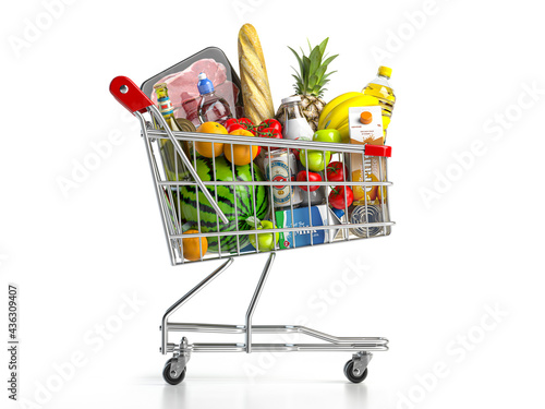 Shopping cart full of food isolated on white. Grocery and food store concept. photo