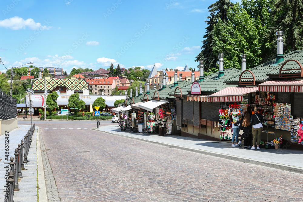 WIELICZKA, POLAND - MAY 26, 2021: A street with stalls full of souvenirs and no tourists due to the covid pandemic.