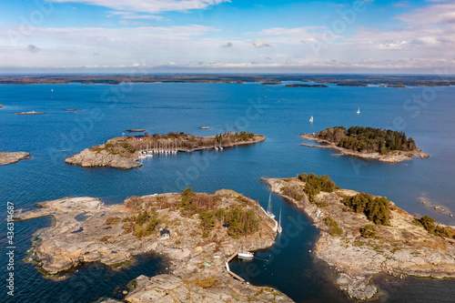 Small island with a sailboat harbor in Finland © Romi