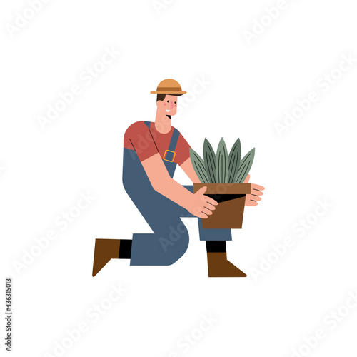 male gardener with houseplant