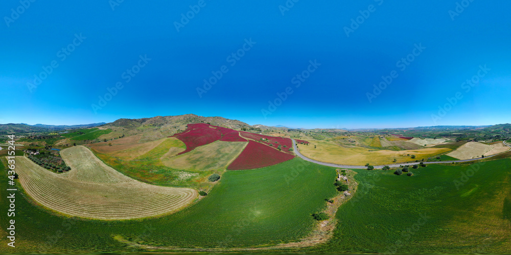 360 degree aerial photo of the red fields in the heart of Sicily in the ...