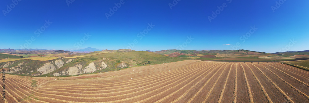 180 degree saerial photo of the wheat fields in the heart of Sicily in ...