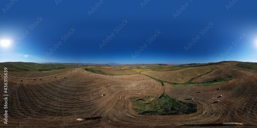 360 degree aerial photo of the wheat fields in the heart of Sicily in ...