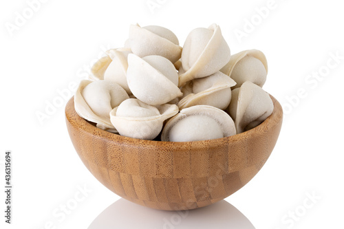 frozen dumplings in wooden bowl isolated on white background