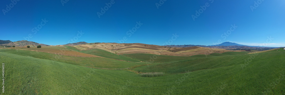 180 degree saerial photo of the wheat fields in the heart of Sicily in ...