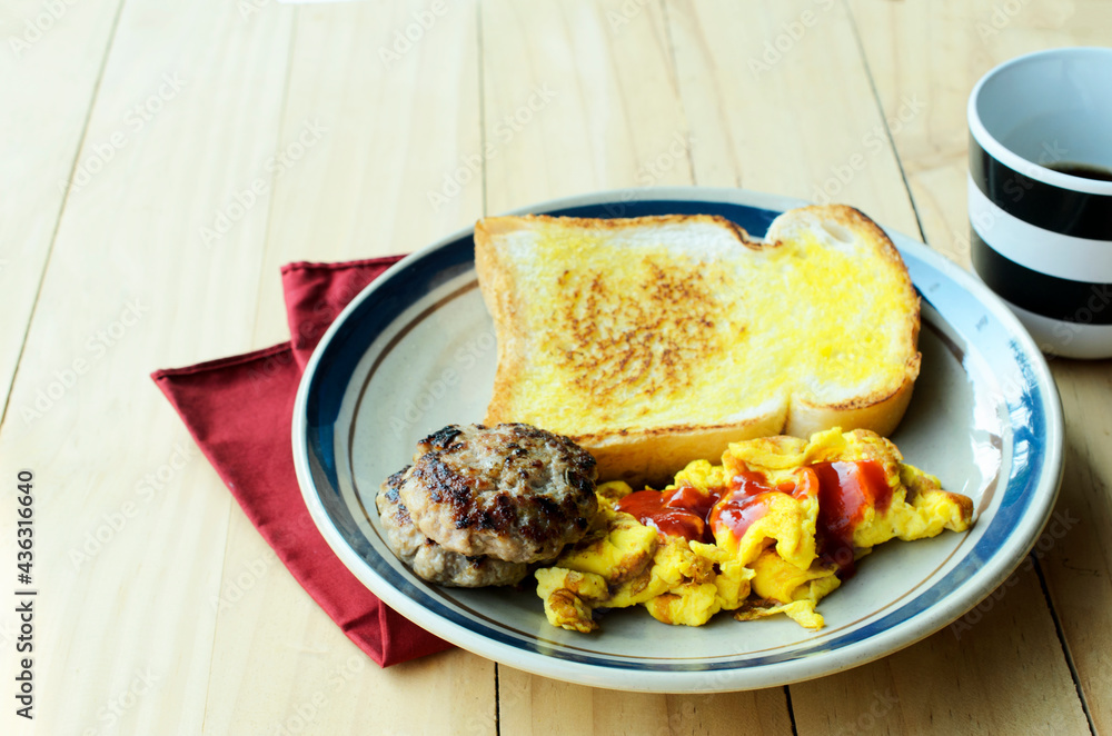 Pork steak and fried eggs and toast and coffee for morning breakfast Pork steak and fried eggs and toast and coffee for morning breakfast
