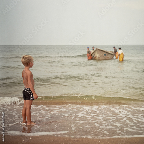 children playing on the beach