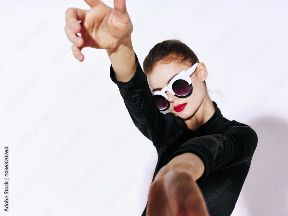 pretty woman in fashion glasses gesturing with hands luxury studio pretty woman in fashion glasses gesturing with hands luxury studio