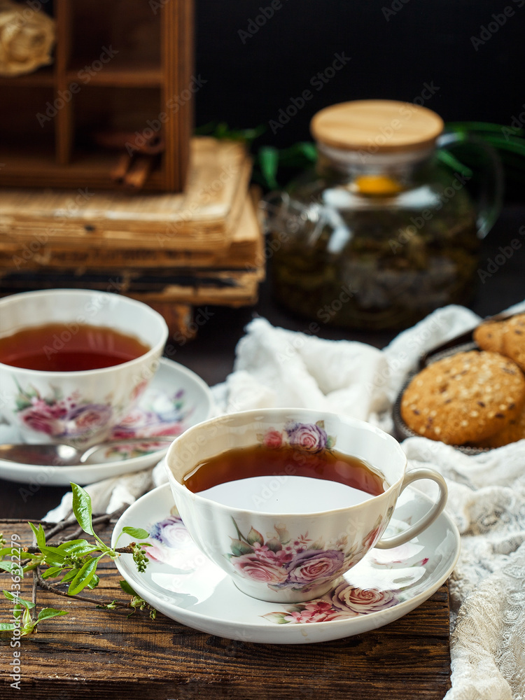 cup of tea and cookies on table cup of tea and cookies on table