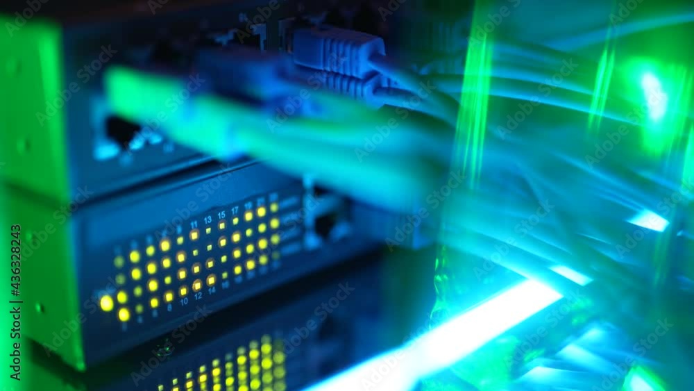 Closeup view of modern network switch with plugged