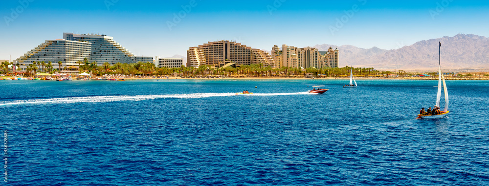 Panoramic view on central public beach of Eilat – famous tourist resort city in Israel, Middle East