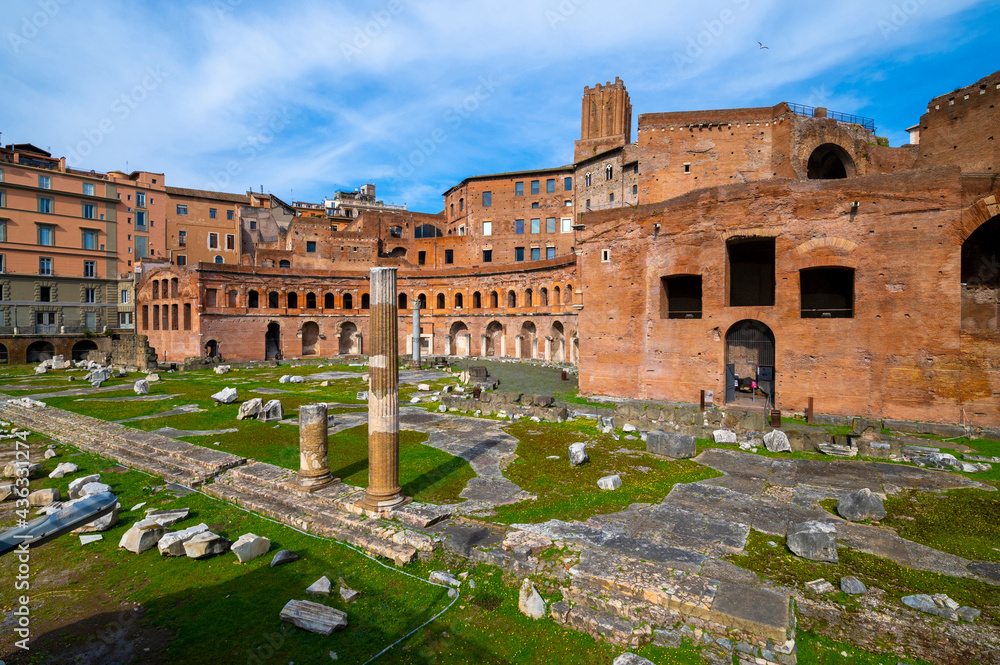 Trajans Markets Rome, with the Torre delle Milizie, remains of Roman buildings on the slopes of the Quirinal hill. The semicircular exedra is articulated on six levels. Remains of columns. Italy.