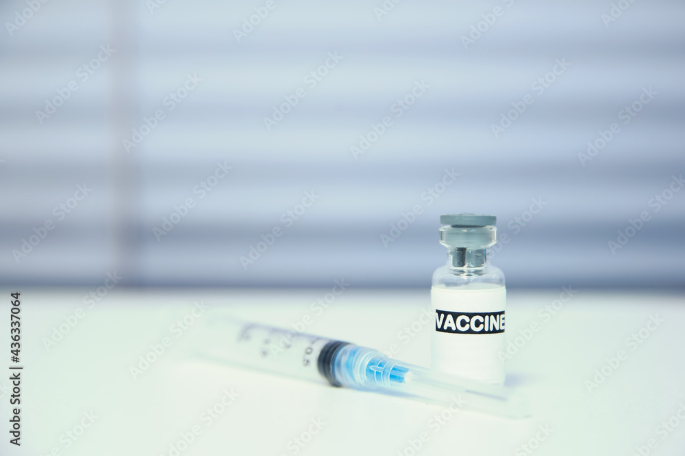 Vaccine vial dose flu shot drug needle syringe,medical concept, vaccination baby child Vaccine vial dose flu shot drug needle syringe,medical concept, vaccination baby child