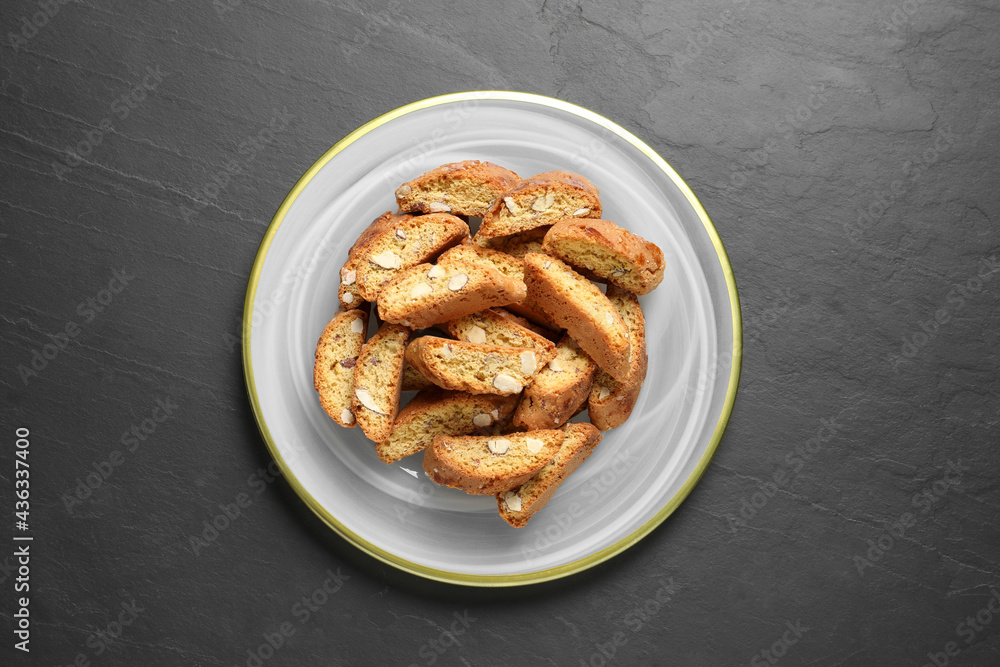 Traditional Italian almond biscuits (Cantucci) on grey table, top view